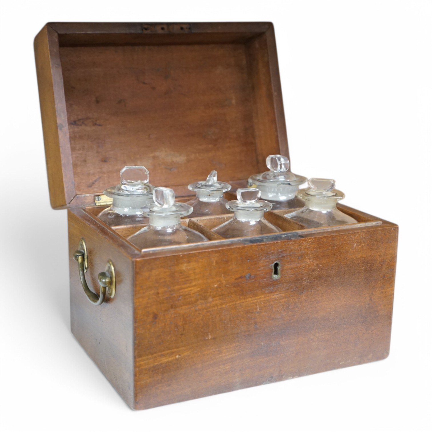 A George III mahogany six bottle apothecary box, 23cm wide
